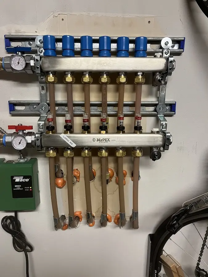 Plumber performing Water Heater Repair at a residential property in Harrogate